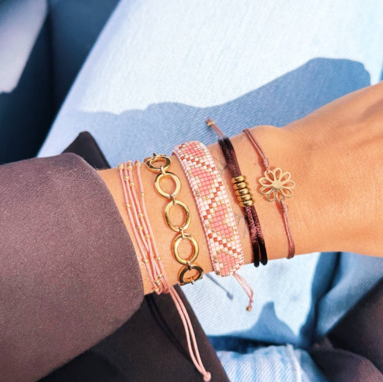 Bazou - Hartpatroon geweven armband koraal/cognac