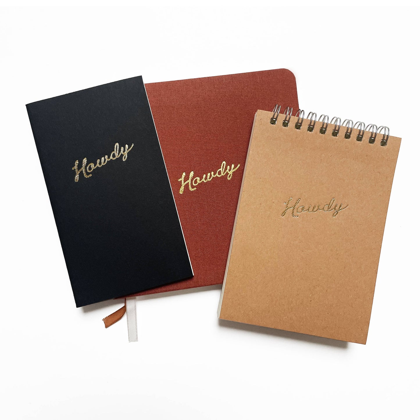 Portmanteau - Vierkant linnen notitieboek met reliëf Howdy goudfolie