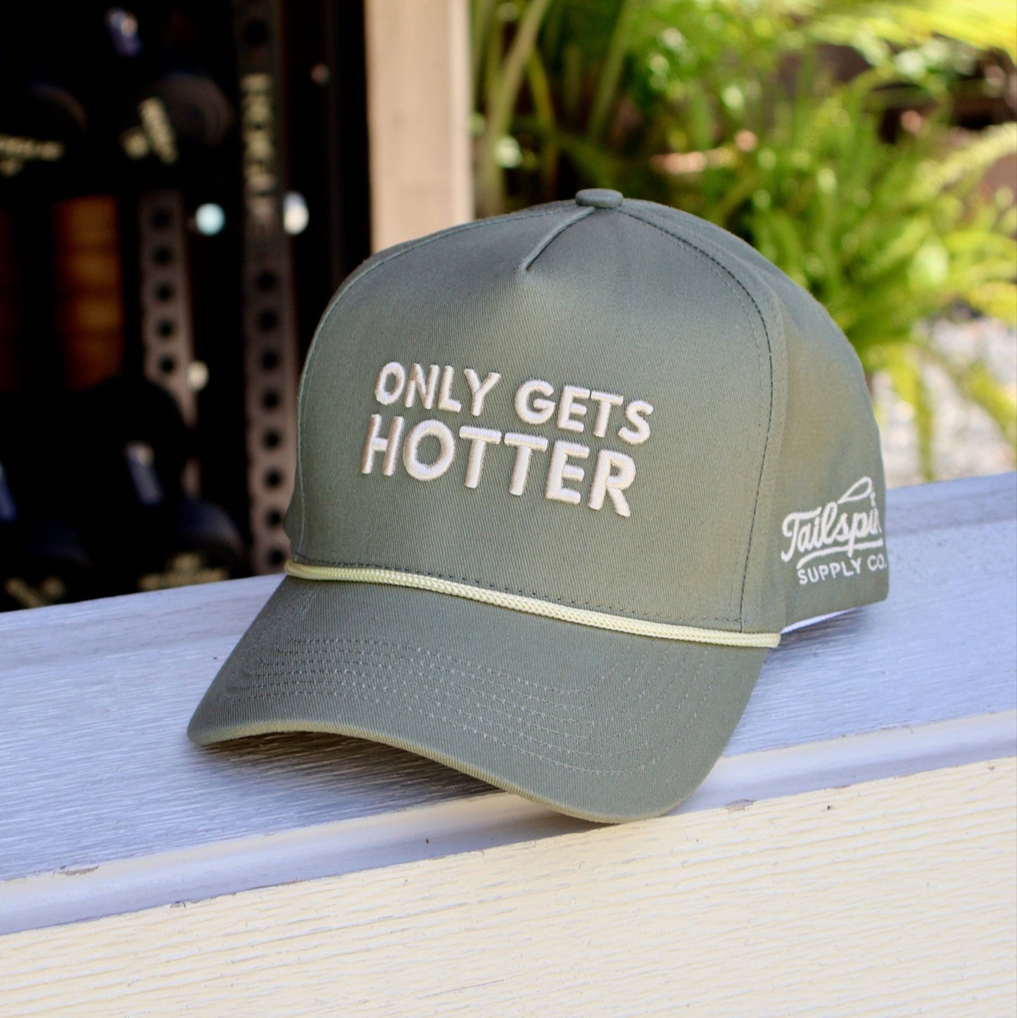 Tailspin - Groene pet Only gets hotter