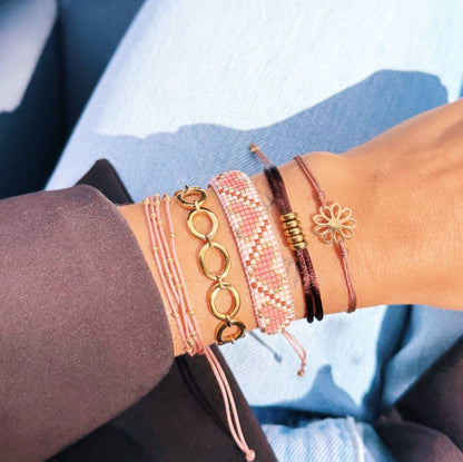 Bazou - Hartpatroon geweven armband koraal/cognac