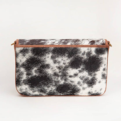 Myra Bag - Loyal West On The Go Mini kettingtas koeienhuid zwart & wit