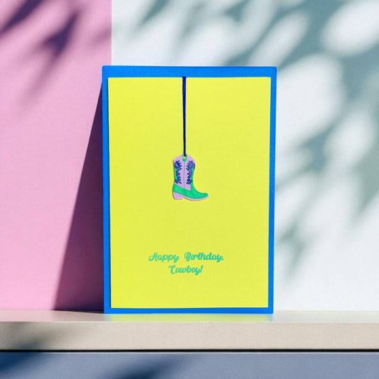 Pink Stories - Neon kaart met cadeauhanger Happy Birthday, Cowboy! blauw