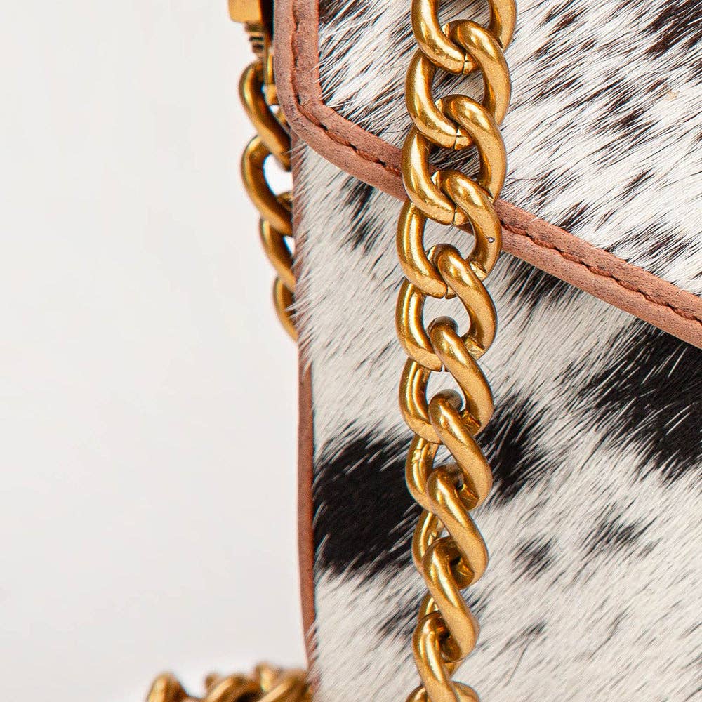 Myra Bag - Loyal West On The Go Mini kettingtas koeienhuid zwart & wit