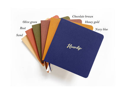 Portmanteau - Quaderno quadrato in lino con rilievo Howdy in foglia oro